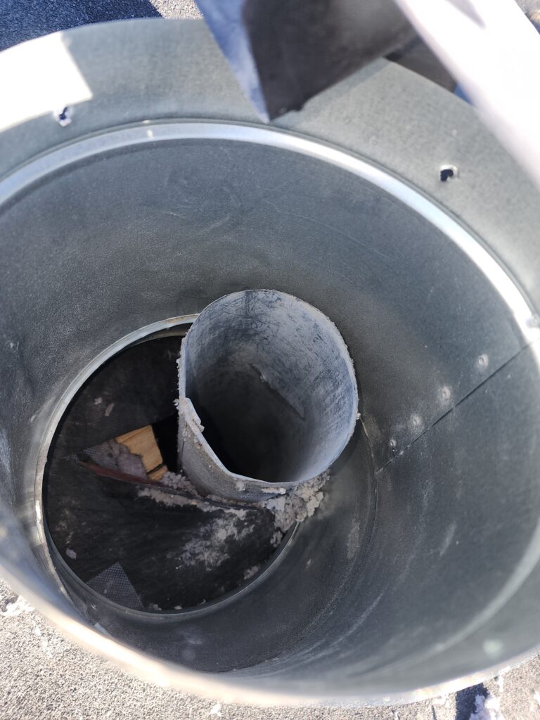 Dryer vent termination that does not meet building code requirements